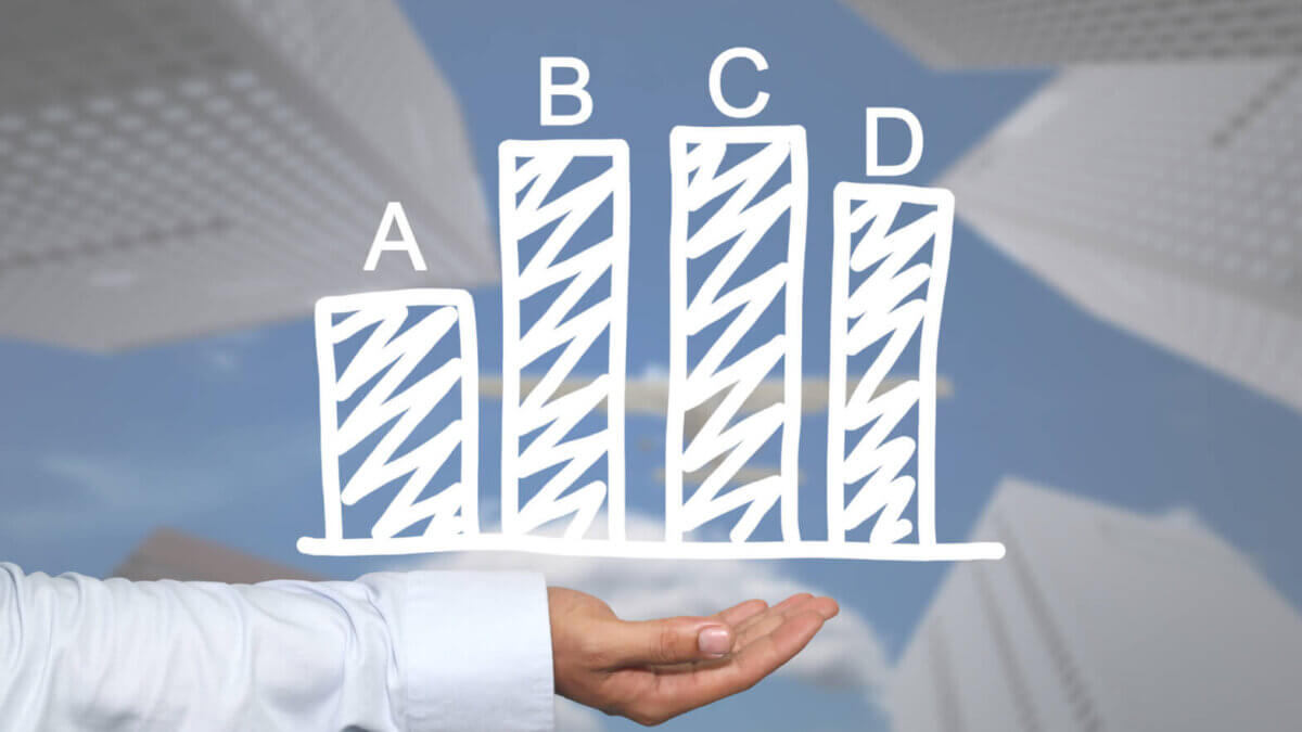 Business bar graph of Hand drawn on a man hand and Skyscraper background for presentation or concept in your business.